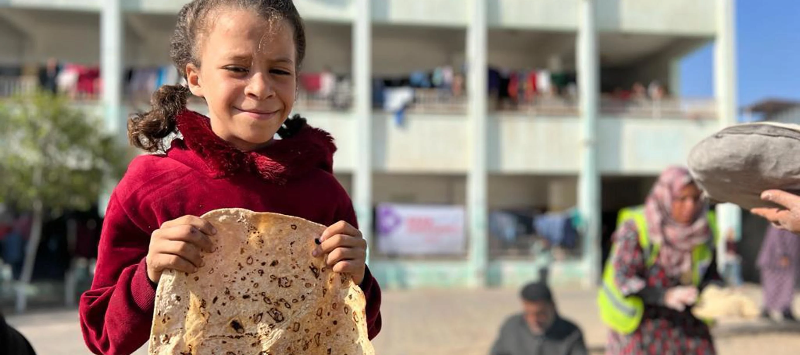 Human Appeal staff members uplift children in Gaza.